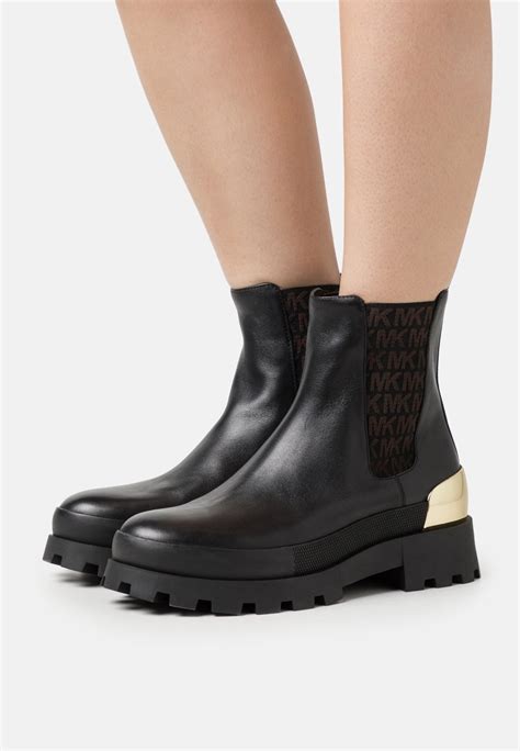 michael kors black boots ankle zipper|Michael Kors adjustable buckle boots.